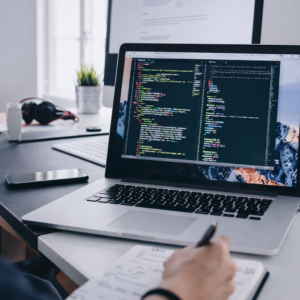 developer's workspace with code and notes